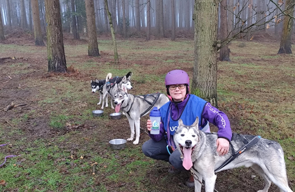 Julie Platt with Huskies