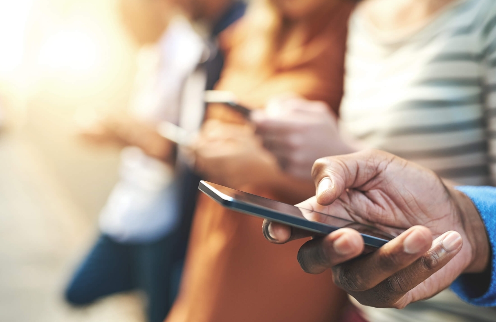 Person holding a cell phone 