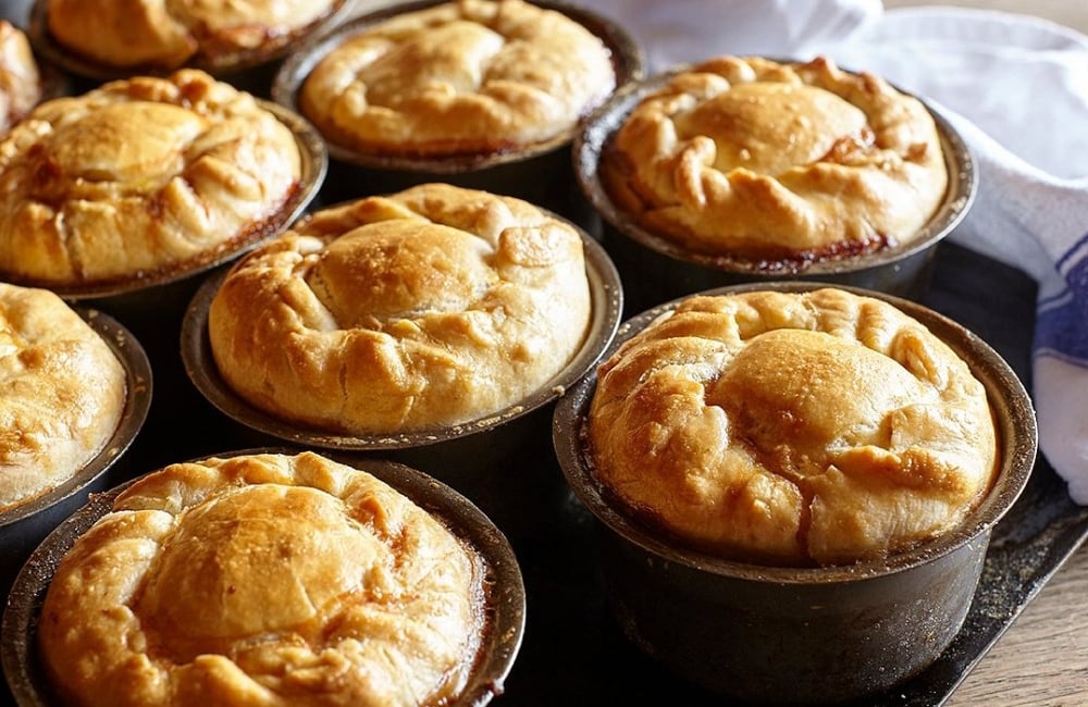 an array of freshly made pies