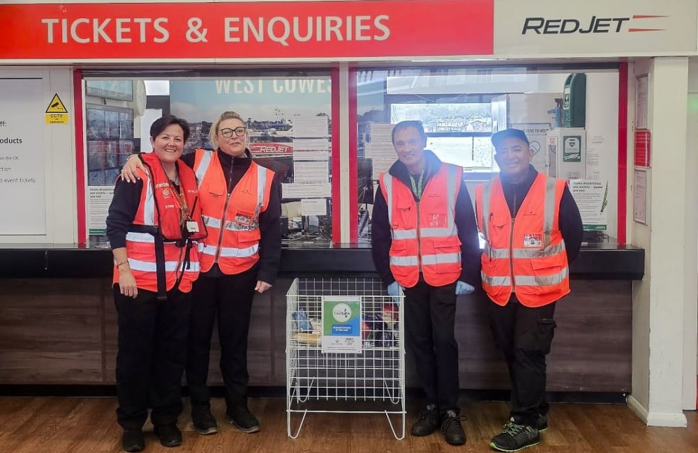 staff with foodbank collection