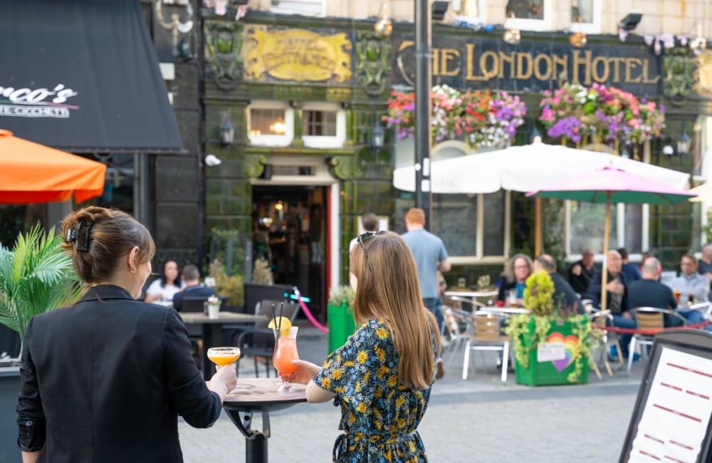 A view of Oxford Street with the London Hotel in the background