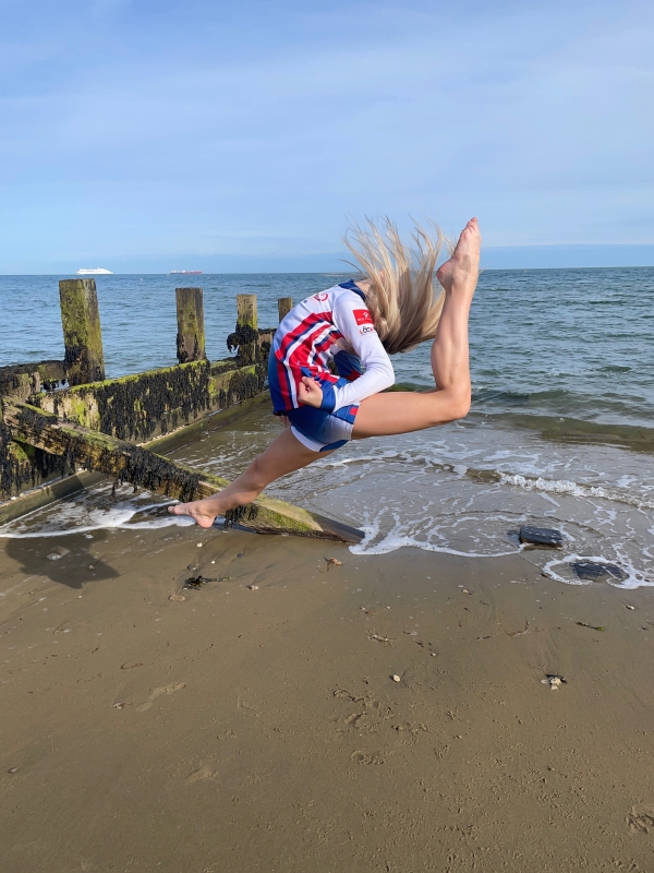 Jess Burfitt jumping in new sponsored jacket