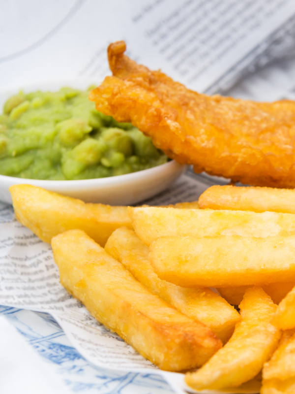 battered fish and chips with mushy peas