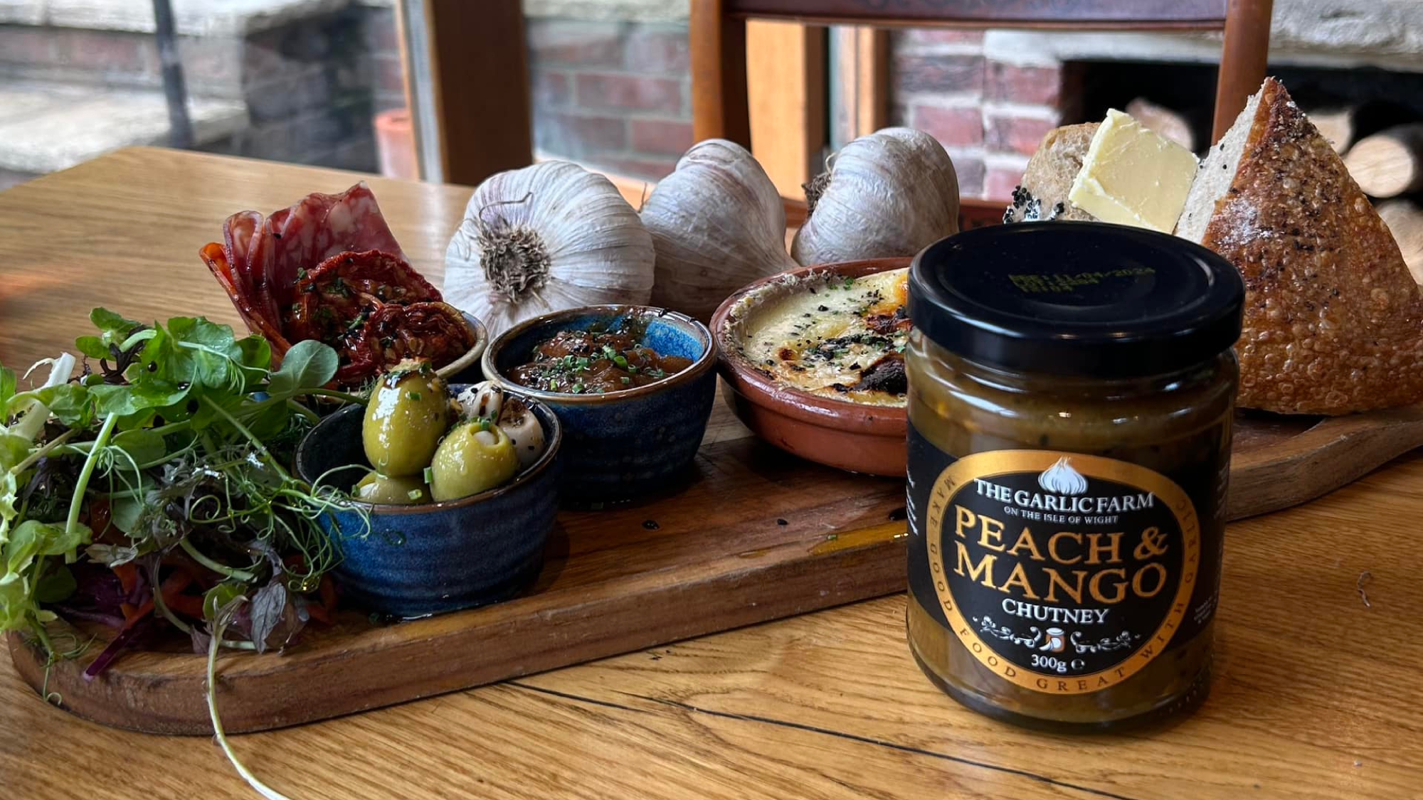 platter of food and garlic farm produce on a table