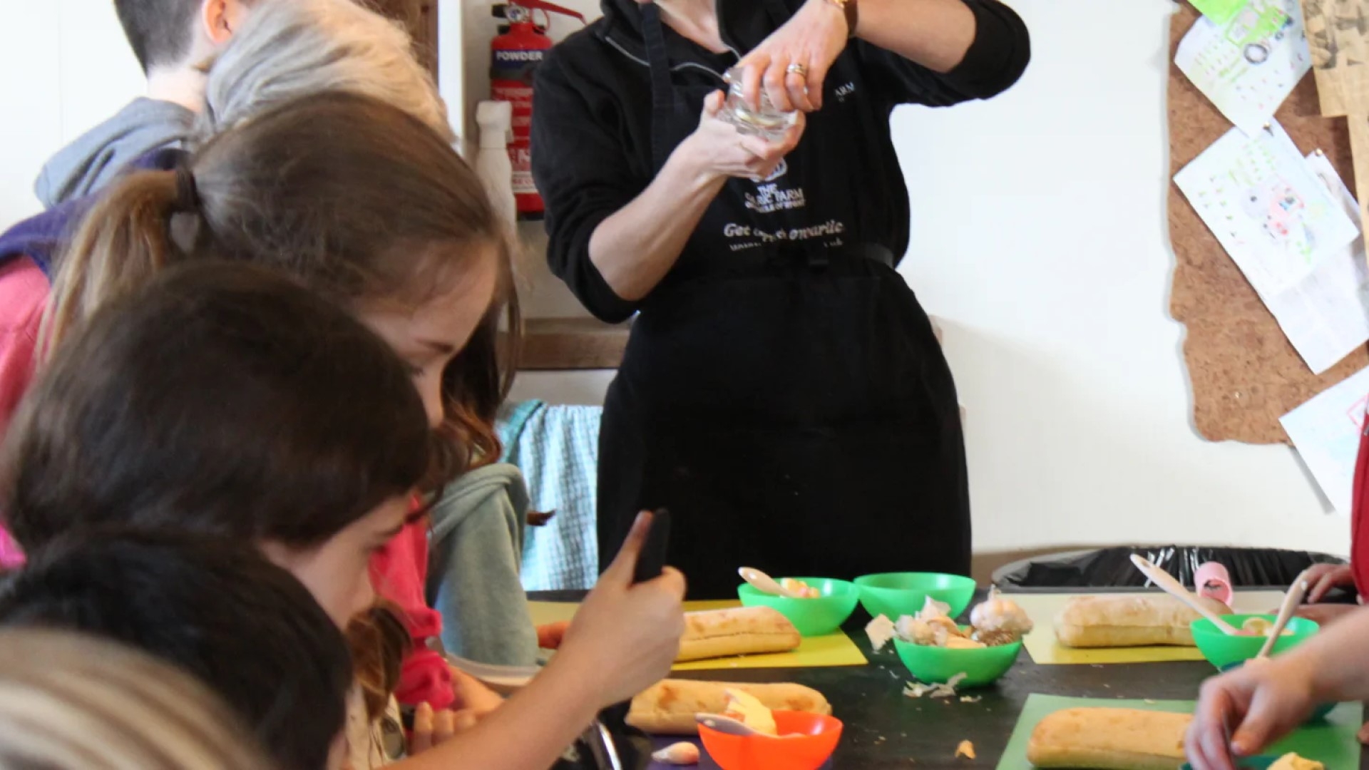 children making garlic bread