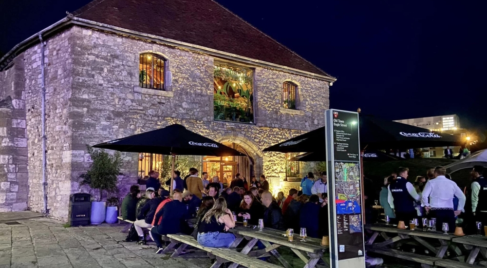 crowds at dancing man brewery at night