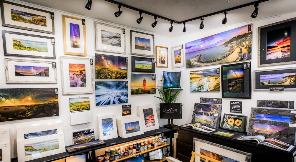 art prints adorning the wall of a studio