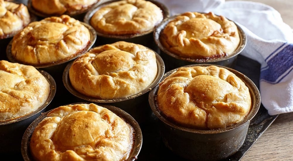 an array of freshly made pies