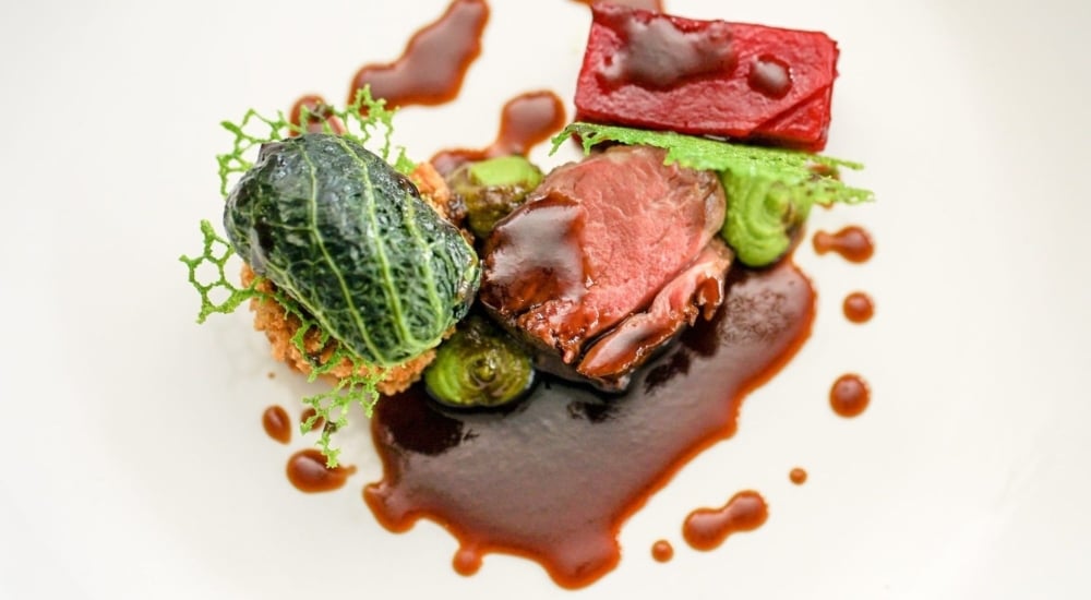 neatly plated lamb dish