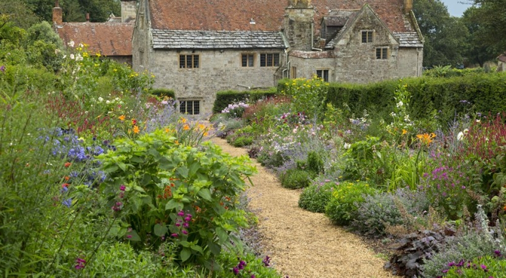 A path through the garden leading to Mottistone Manor Farmhouse