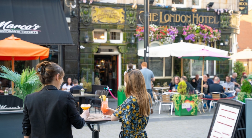 A view of Oxford Street with the London Hotel in the background